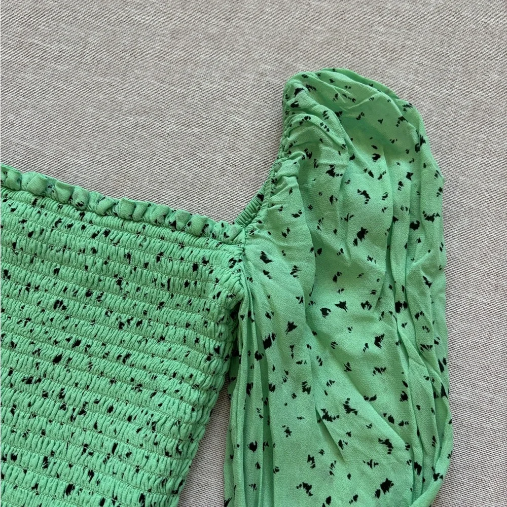 Aritzia green cropped chiffon top.